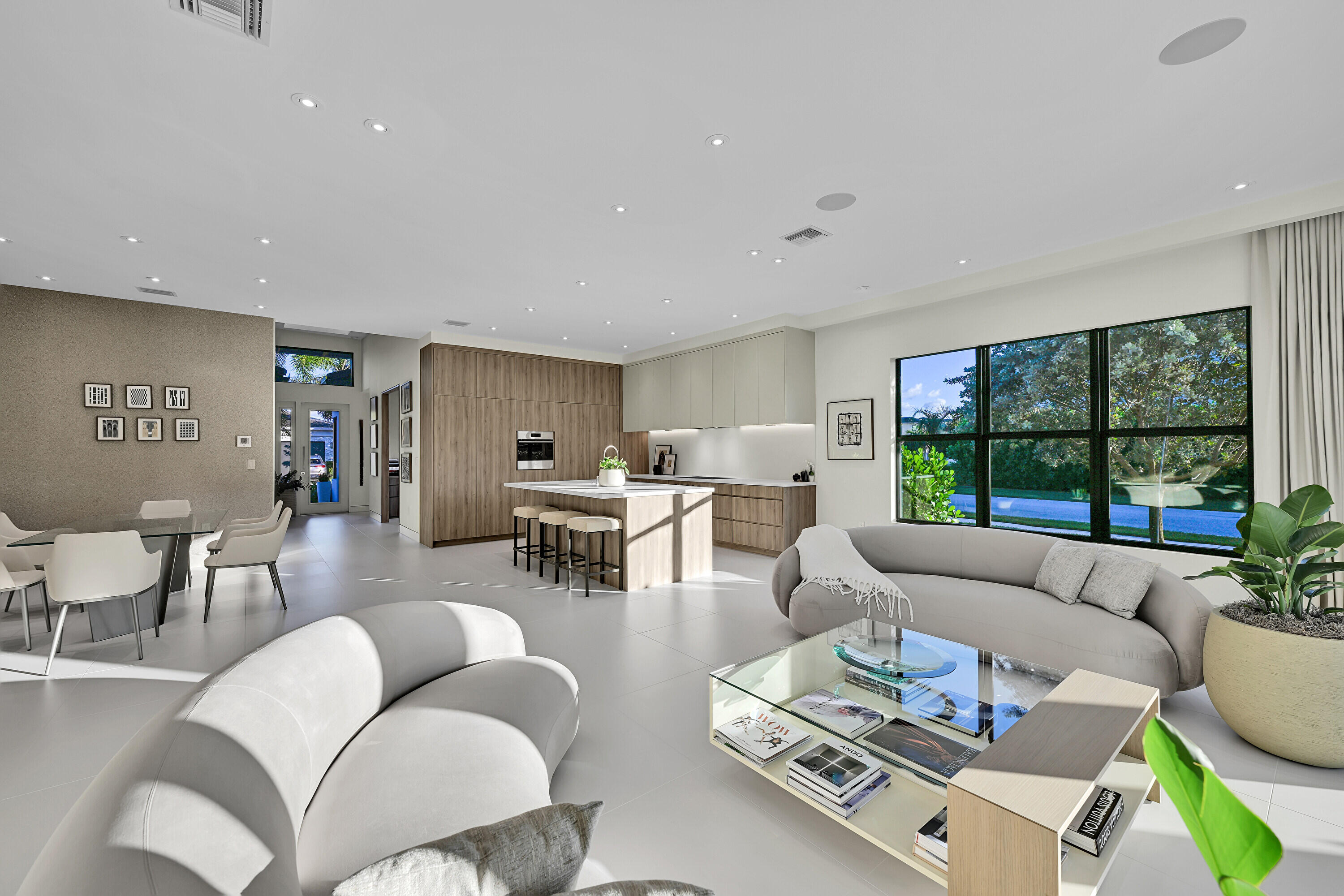 8538 Apple Falls Lane Boca Raton, FL 33496 - Photo 12 of 28 a living room with furniture and a large window