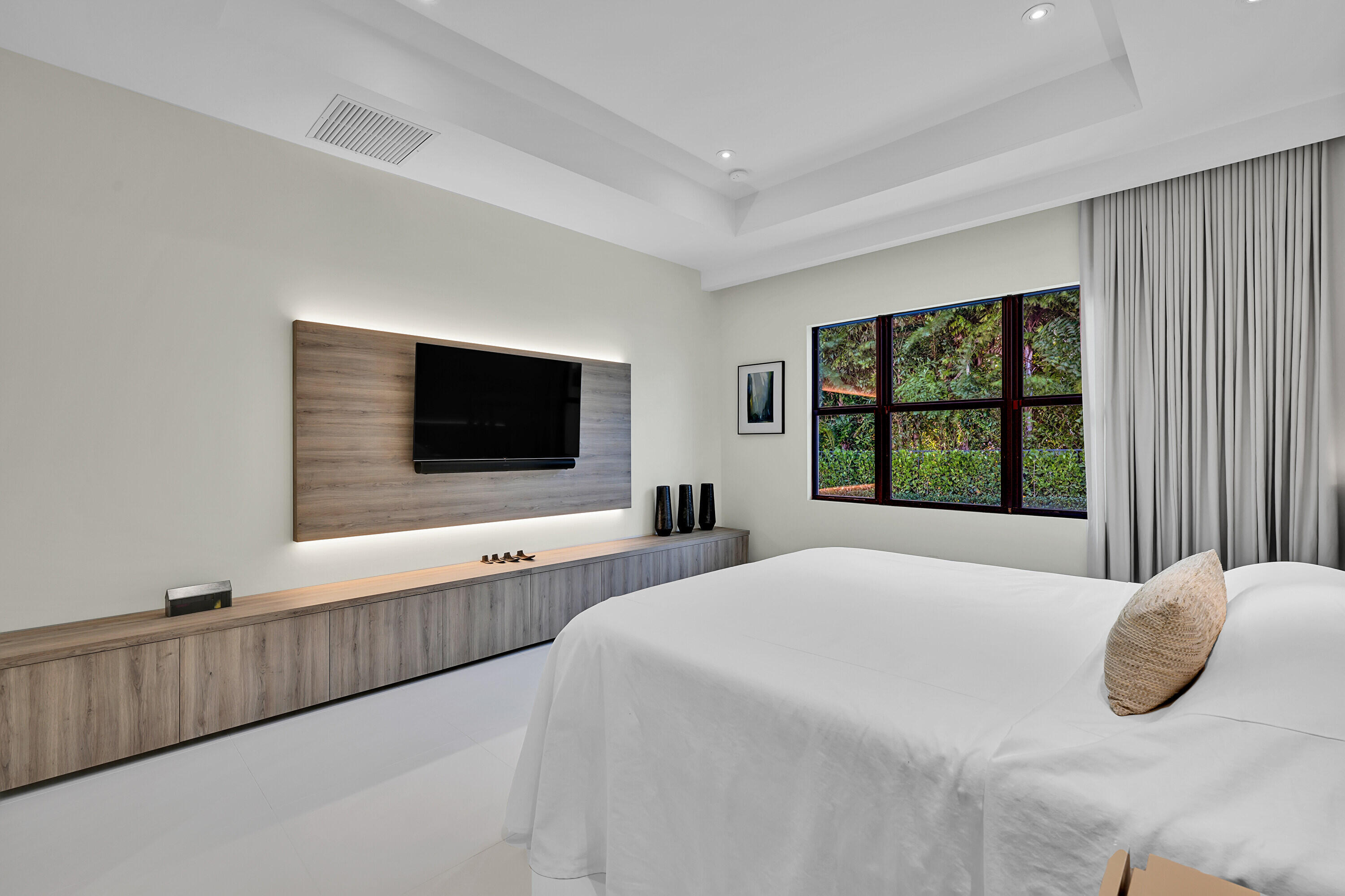 8538 Apple Falls Lane Boca Raton, FL 33496 - Photo 14 of 28 a bedroom with a bed and a flat screen tv