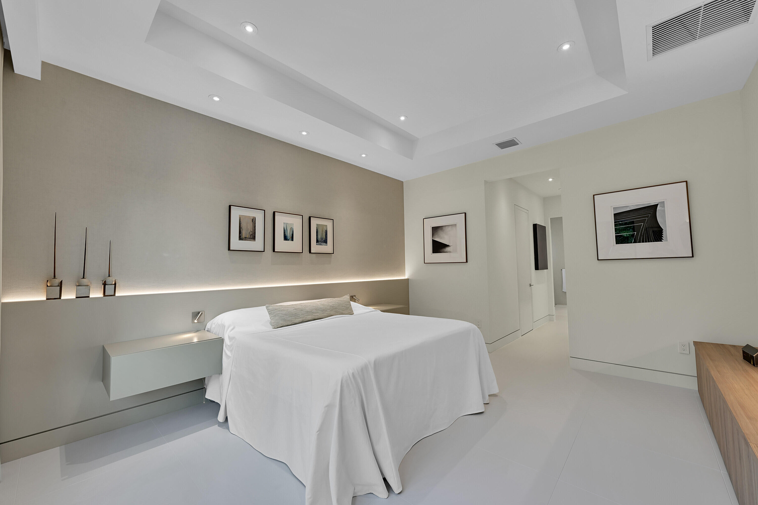 8538 Apple Falls Lane Boca Raton, FL 33496 - Photo 16 of 28 a bedroom with a bed and a night stand