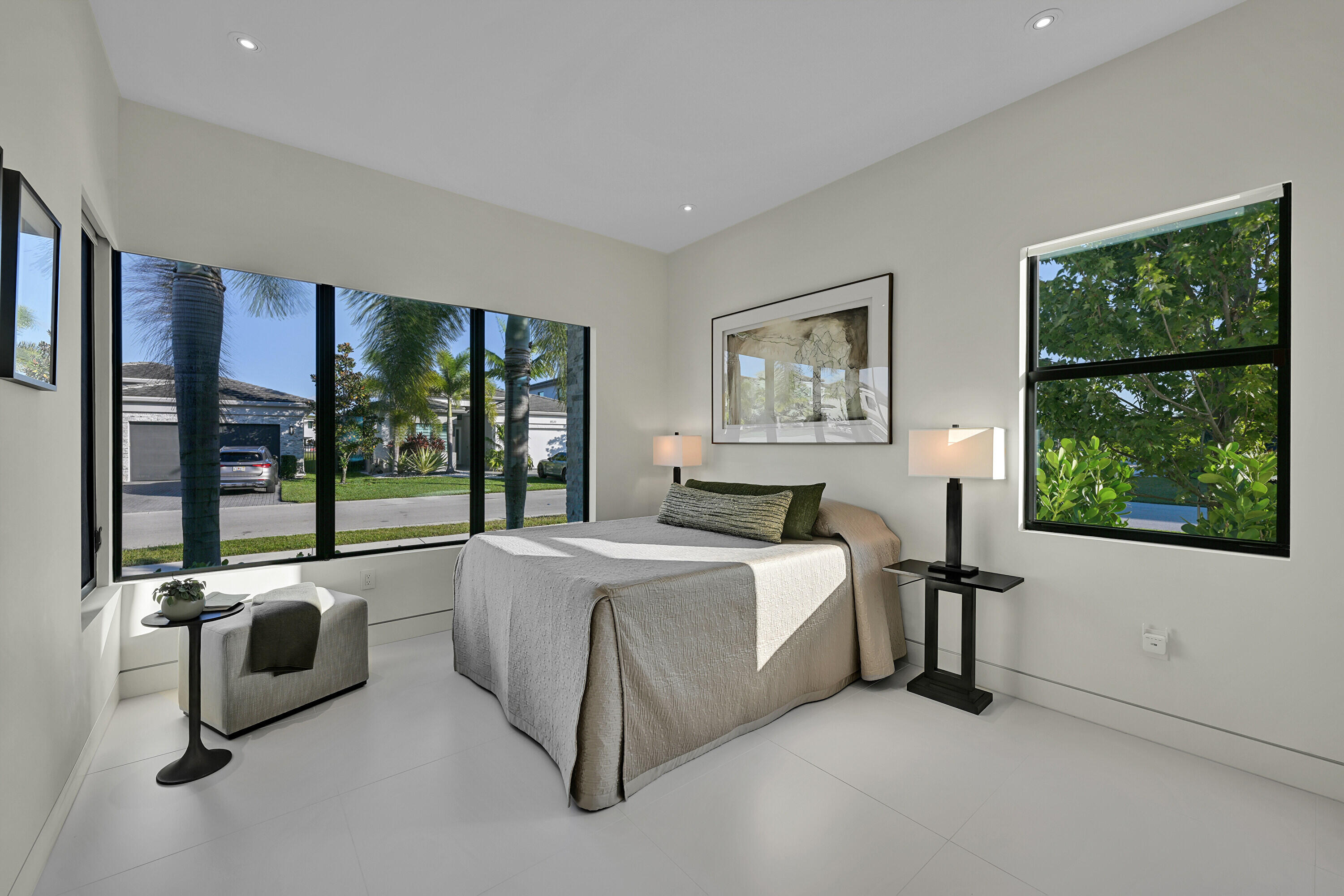 8538 Apple Falls Lane Boca Raton, FL 33496 - Photo 17 of 28 a bed room with a bed and a couch