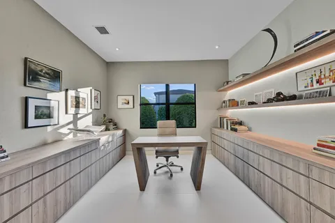 a living room with furniture and white walls