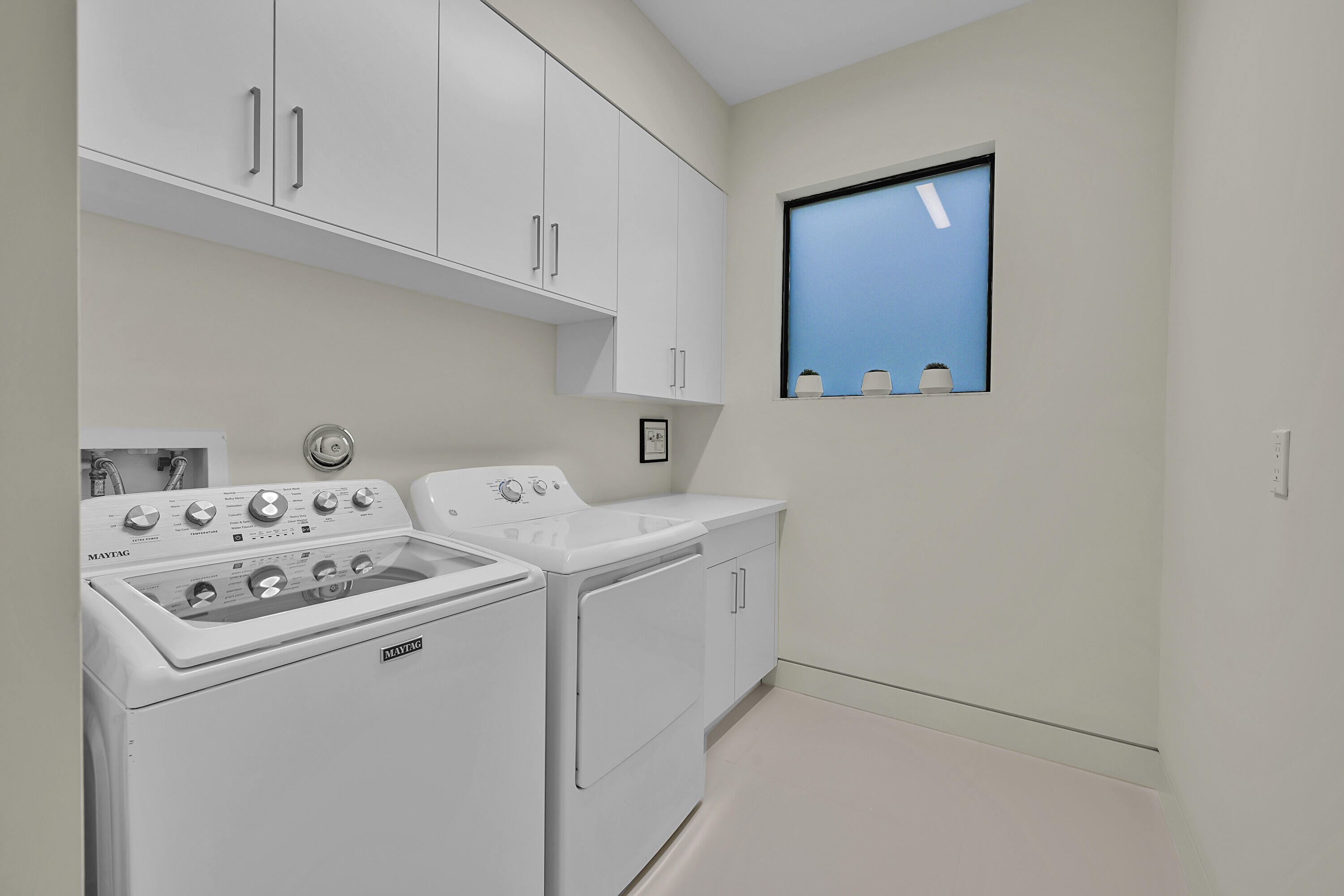 8538 Apple Falls Lane Boca Raton, FL 33496 - Photo 20 of 28 a utility room with dryer and washer