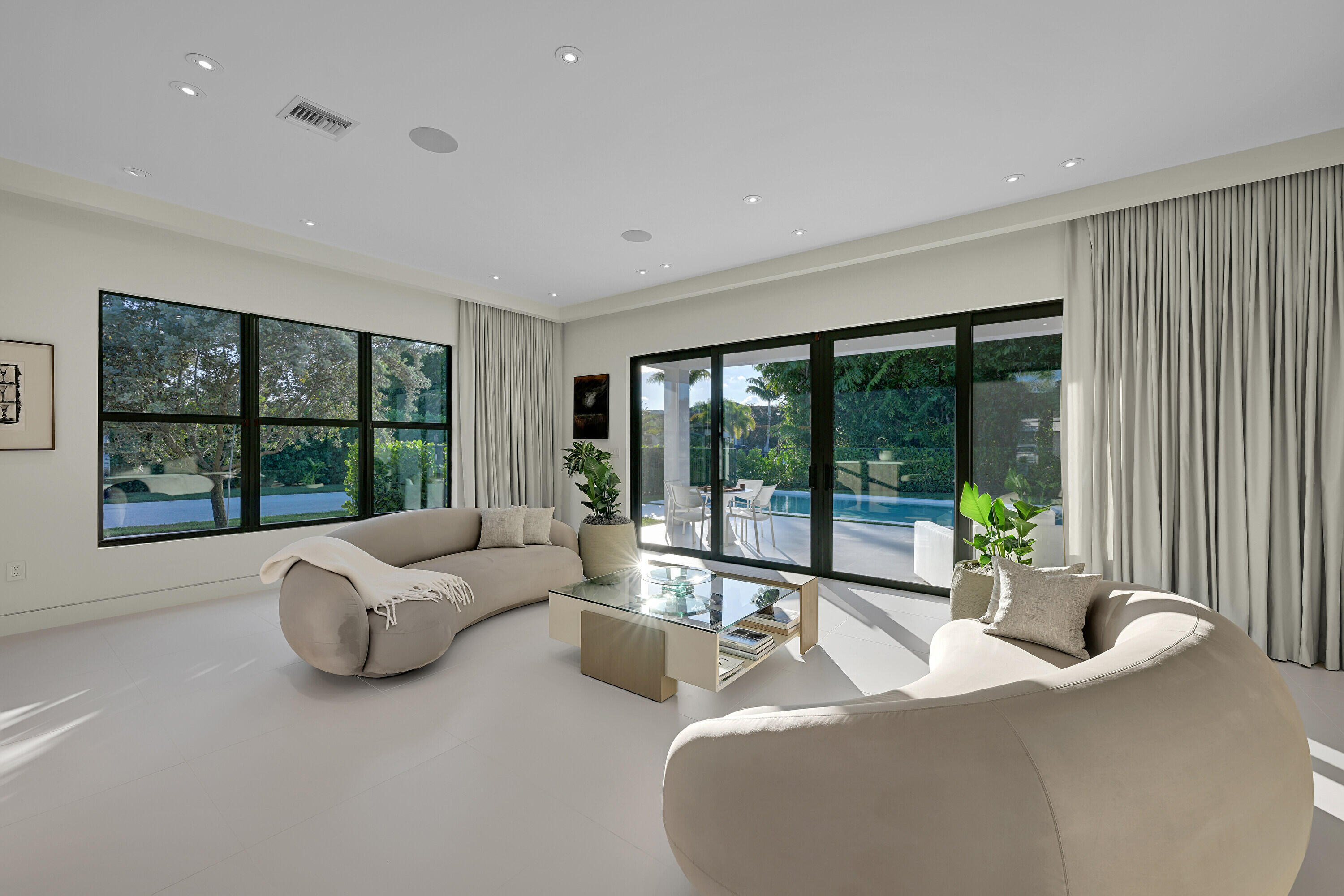8538 Apple Falls Lane Boca Raton, FL 33496 - Photo 9 of 28 a living room with furniture and a large window