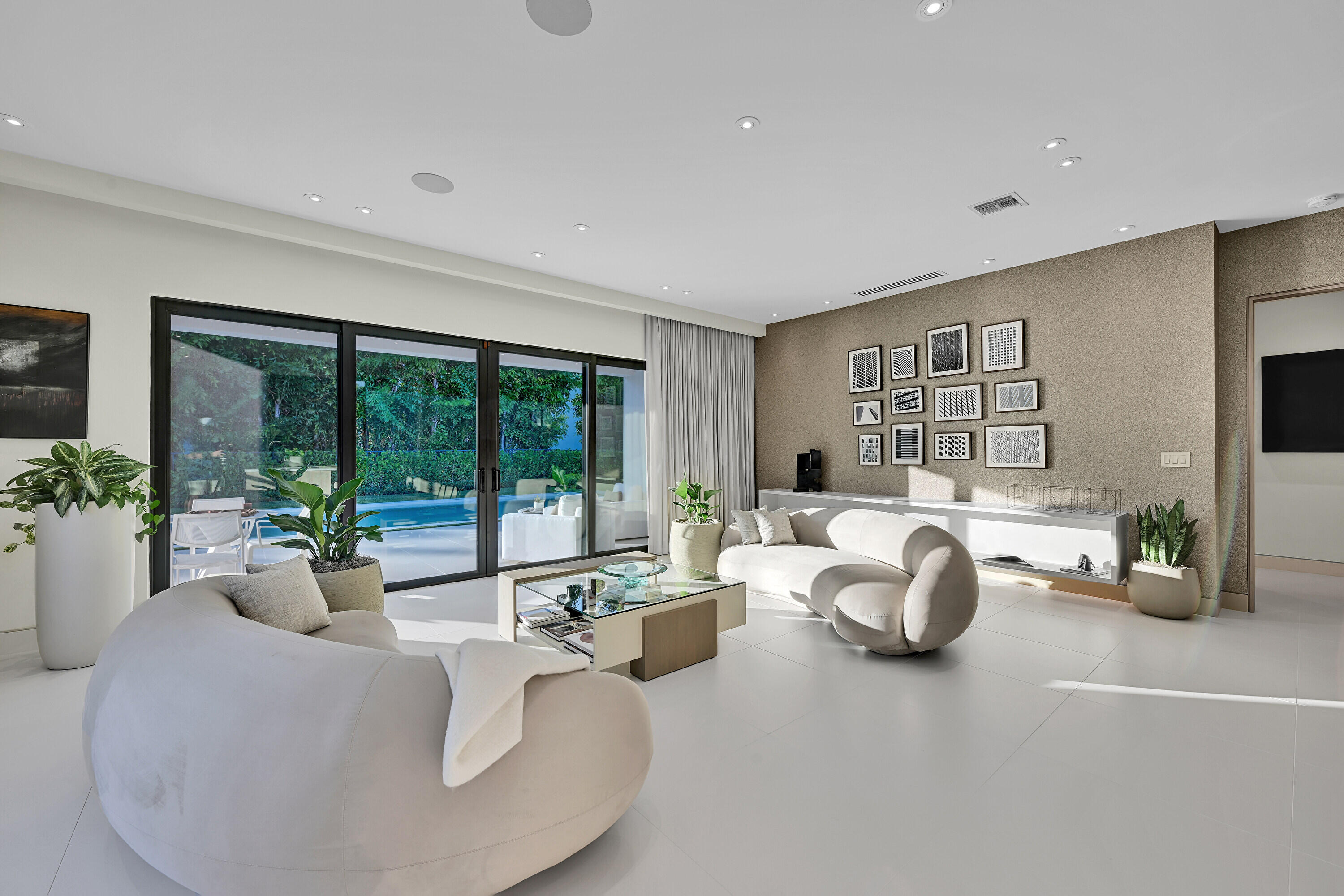 8538 Apple Falls Lane Boca Raton, FL 33496 - Photo 10 of 28 a living room with furniture and large windows