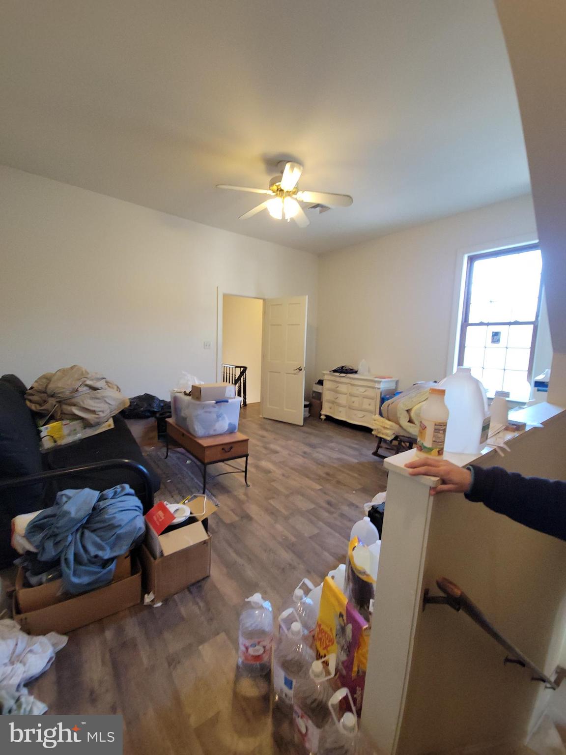 565 Main Street Lykens, PA 17048 - Photo 14 of 29 a living room with furniture and a chandelier