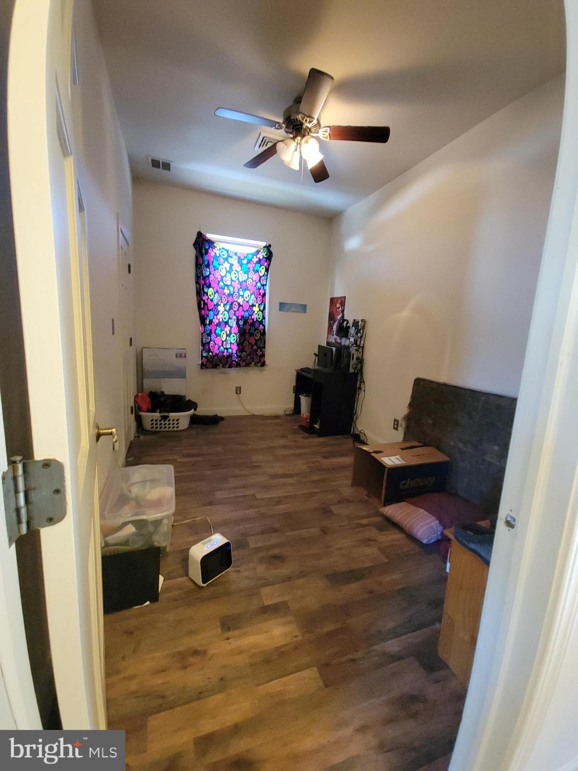 565 Main Street Lykens, PA 17048 - Photo 15 of 29 a living room with furniture and a flat screen tv