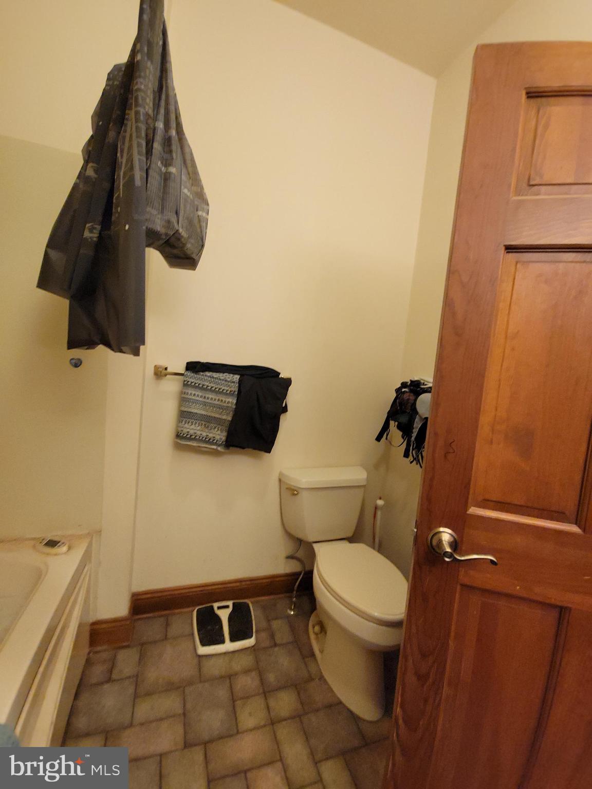 565 Main Street Lykens, PA 17048 - Photo 21 of 29 a bathroom with a toilet and a shower