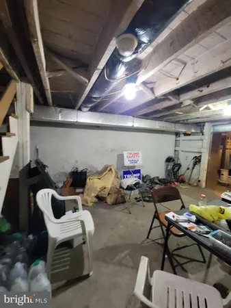 a outdoor space with lots of chairs and a projector