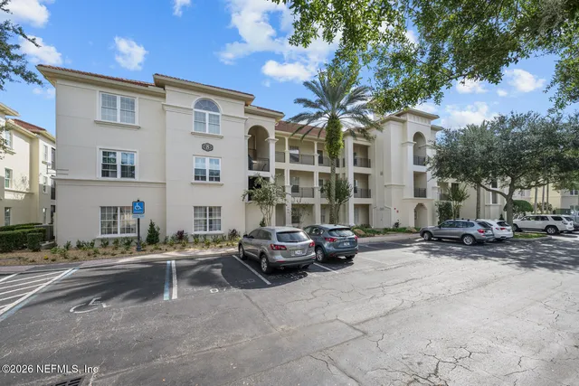 a cars parked in front of a building