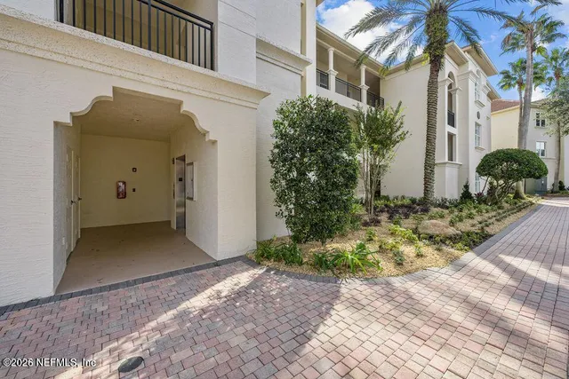 a view of a back yard of the house