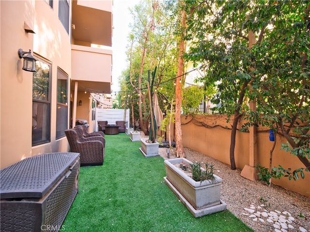 a view of a couches in the backyard of the house