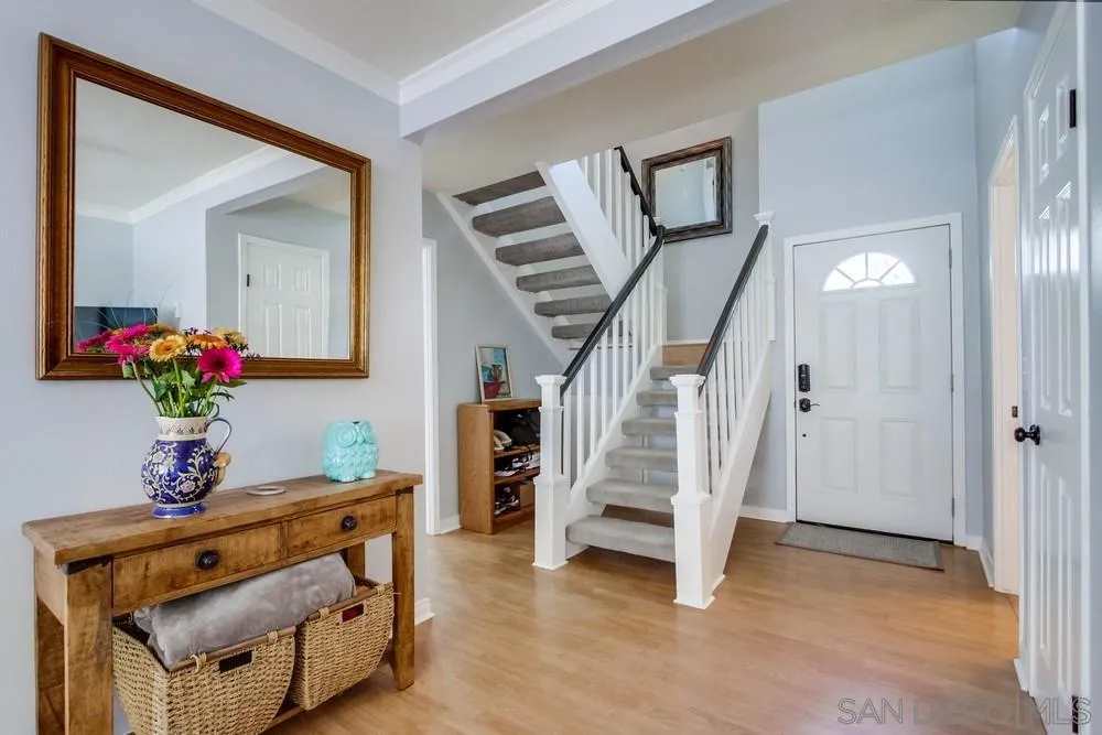 284 Gardendale Road Encinitas, CA 92024 - Photo 14 of 59 a view of an entryway with wooden floor and a front door