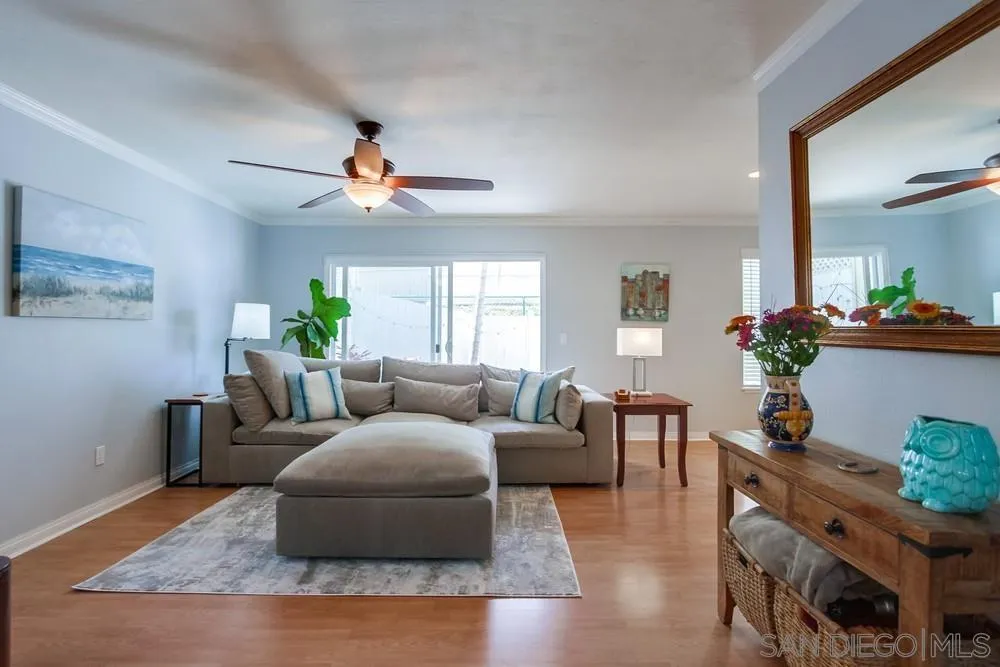 284 Gardendale Road Encinitas, CA 92024 - Photo 16 of 59 a living room with furniture potted plant and a window