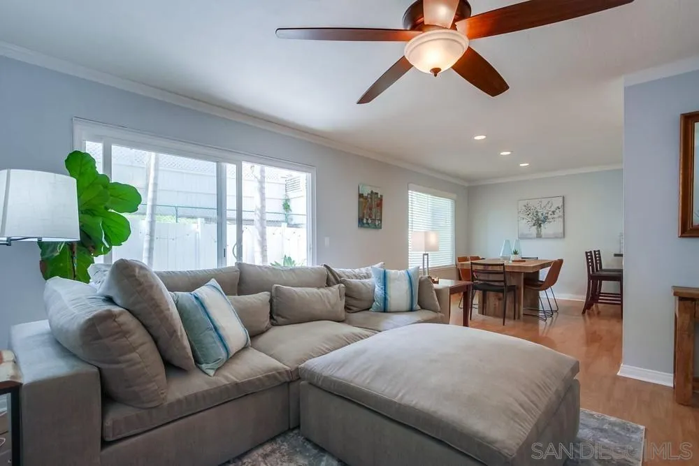 284 Gardendale Road Encinitas, CA 92024 - Photo 17 of 59 a living room with furniture a window and a chandelier