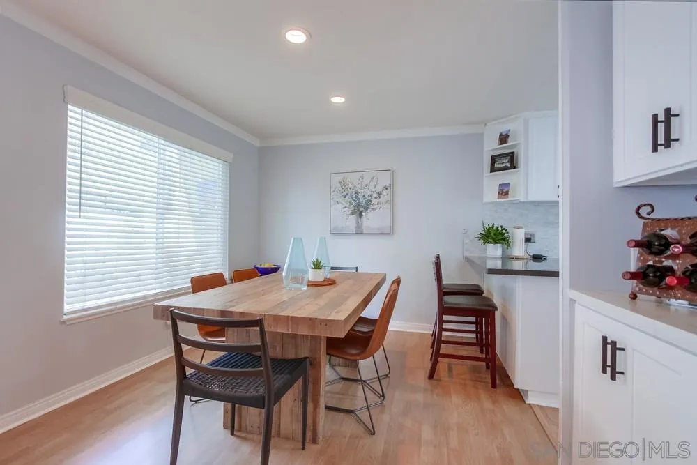 284 Gardendale Road Encinitas, CA 92024 - Photo 20 of 59 a view of a dining room with furniture and wooden floor