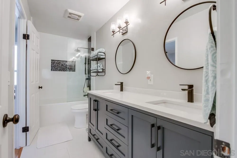 284 Gardendale Road Encinitas, CA 92024 - Photo 36 of 59 a bathroom with a sink and a mirror