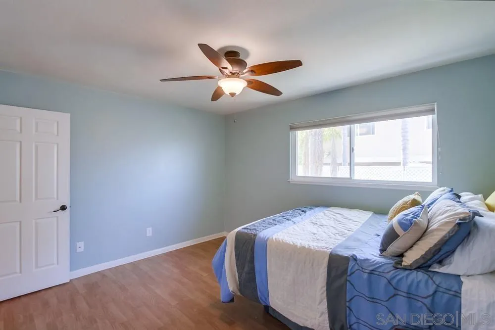 284 Gardendale Road Encinitas, CA 92024 - Photo 42 of 59 a bedroom with a bed and a window