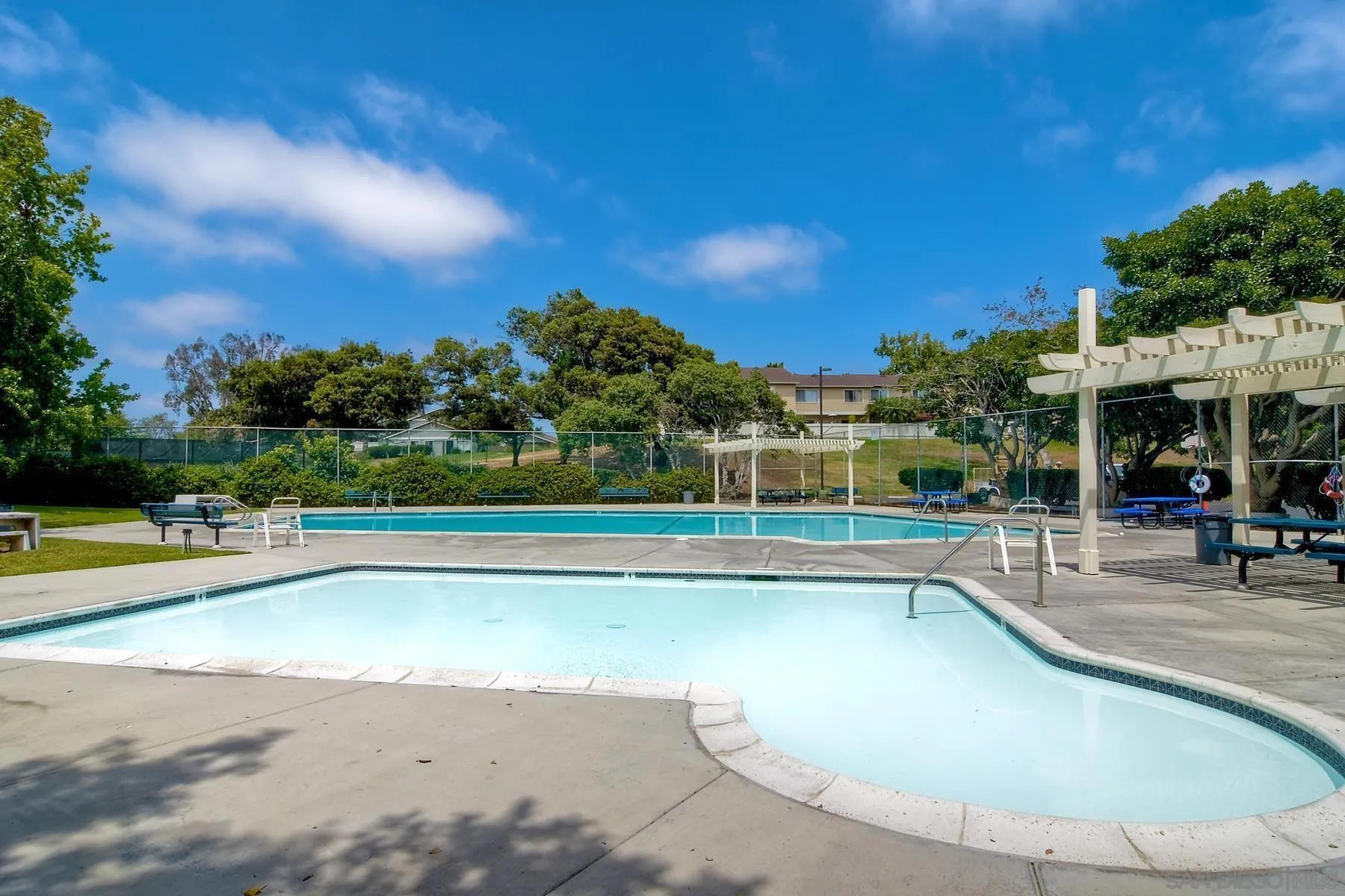 284 Gardendale Road Encinitas, CA 92024 - Photo 59 of 59 a view of a swimming pool with a lawn chairs