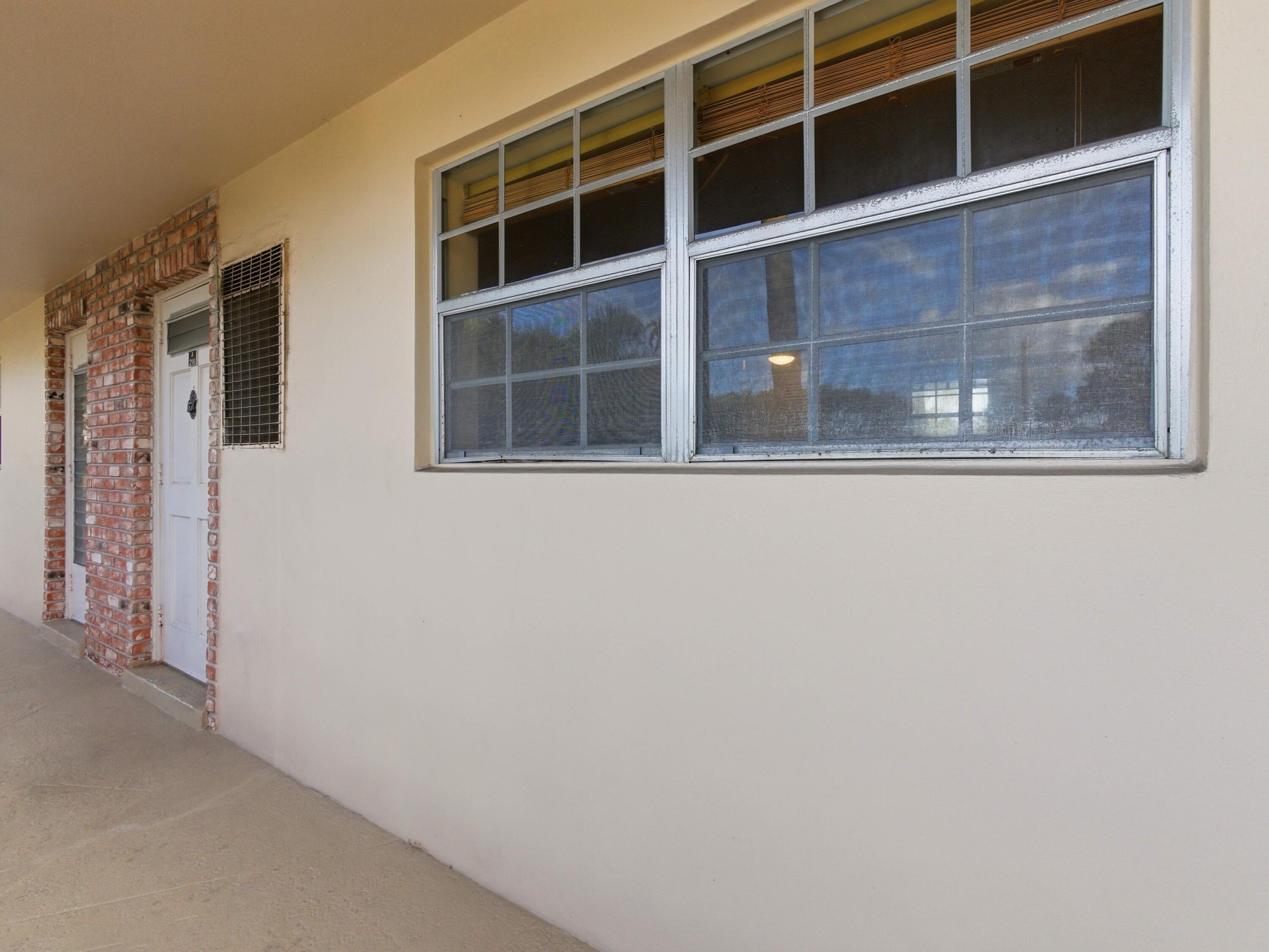400 Northeast 20th Street, Unit A216 Boca Raton, FL 33431 - Photo 11 of 32 a view of front door