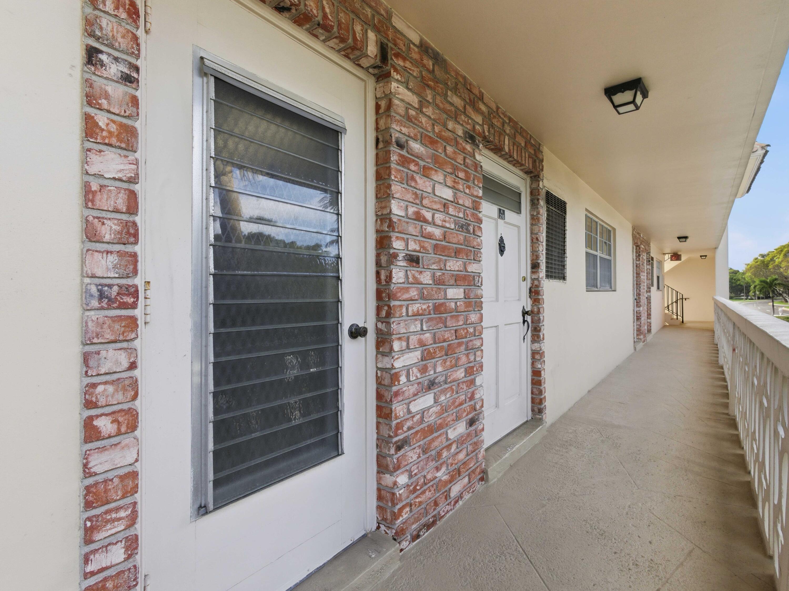 400 Northeast 20th Street, Unit A216 Boca Raton, FL 33431 - Photo 12 of 32 a view of front door of house