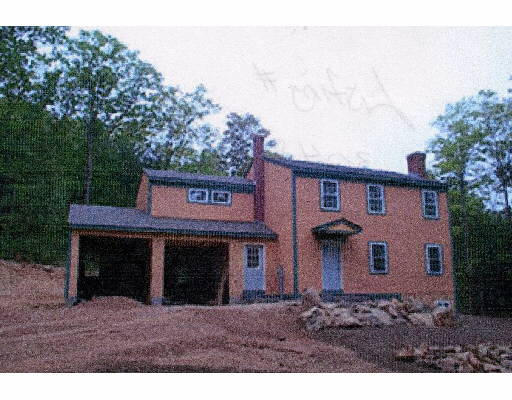 Lot 3 Depot Road Leverett, MA 01054 - Photo 1 of 1 a view of a house with a yard and garage