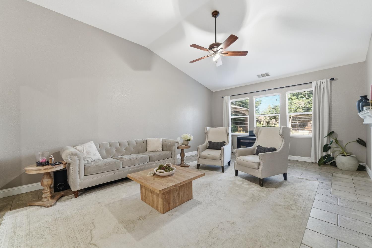 2220 Ellison Drive Modesto, CA 95355 - Photo 6 of 53 a living room with furniture and a large window