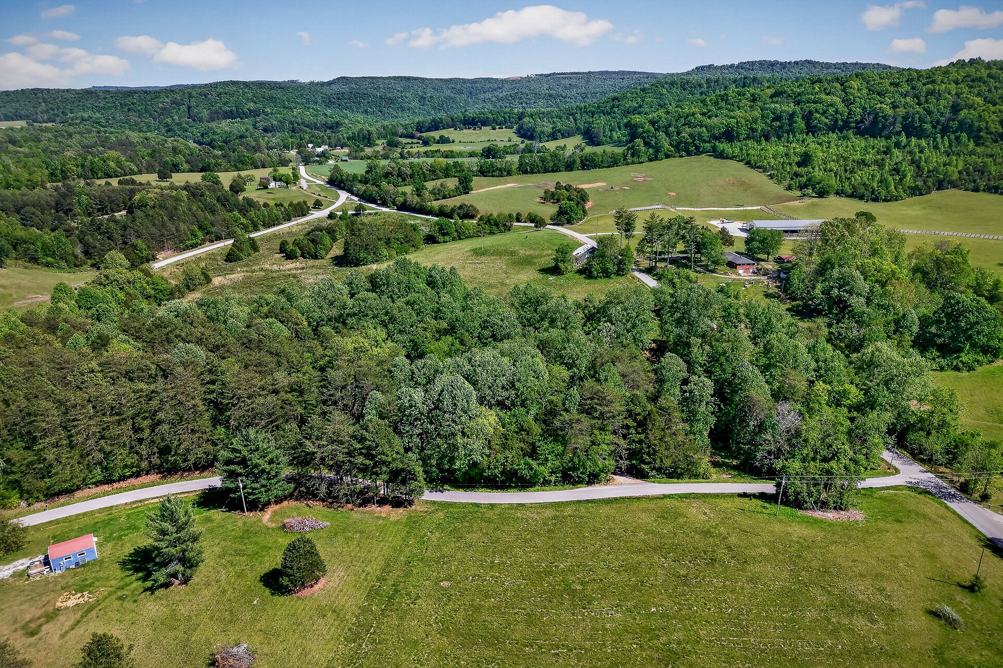 0 Sparkman Town Road Doyle, TN 38559 - Photo 3 of 11 an aerial view of residential houses with outdoor space and trees