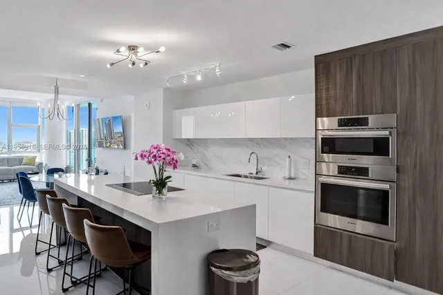 $10,000 | 851 Northeast 1st Avenue, Unit 2401, Miami, FL 33132