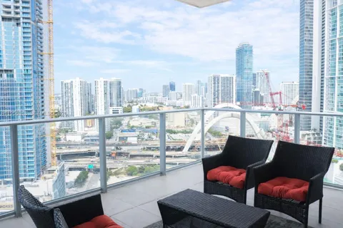 a bathroom with a bathtub sink vanity and mirror