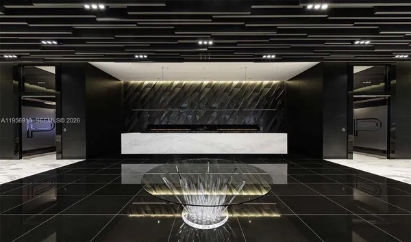 a view of a storage & utility room with a sink