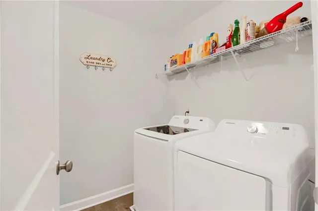 a utility room with dryer and washer