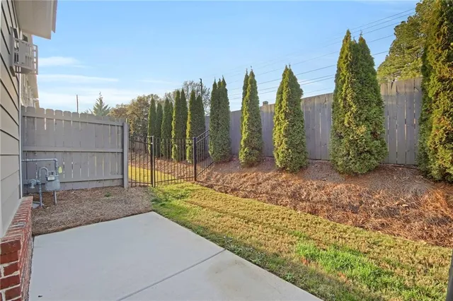 a view of a garden with palm trees