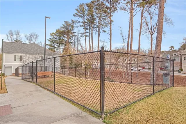 a front view of a house with patio furniture