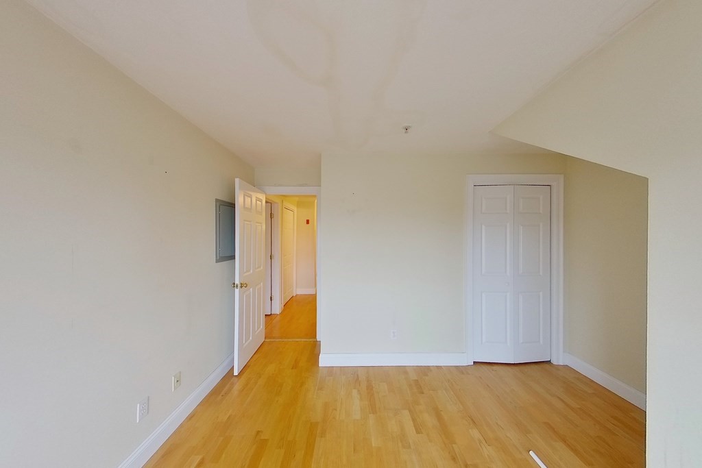 22 Forge Pond, Unit G Canton, MA 02021 - Photo 6 of 13 a view of small space with wooden floor