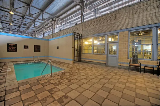 a room with lots of table and chairs