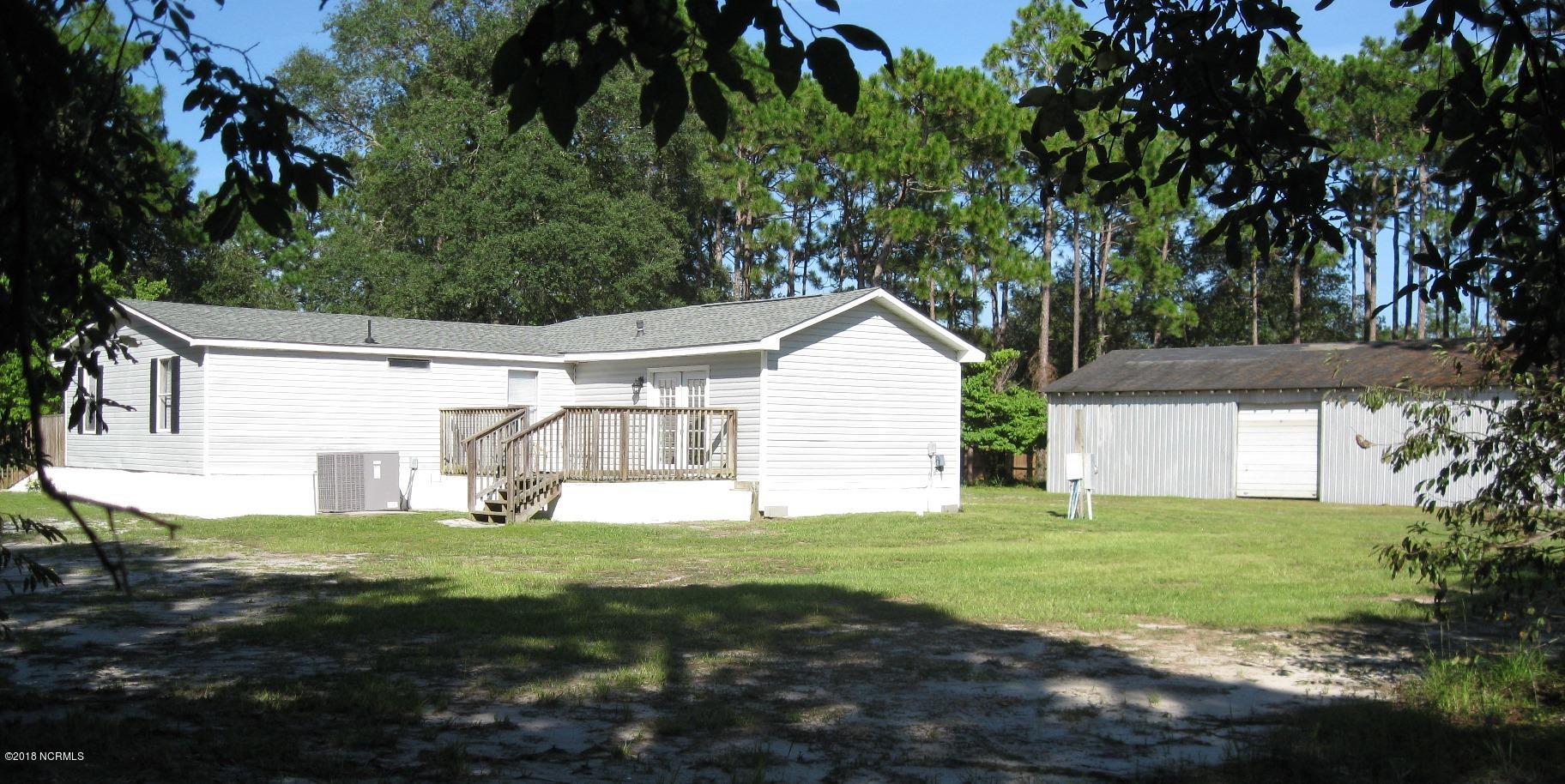 2621 Stone Chimney Road Southwest Supply, NC 28462 - Photo 4 of 20 Workshop in back