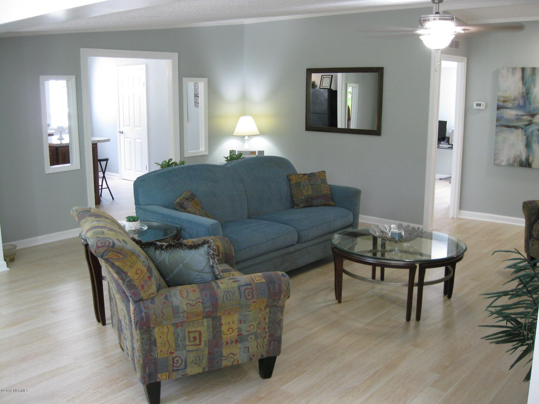 2621 Stone Chimney Road Southwest Supply, NC 28462 - Photo 6 of 20 Bright and Open Living Area