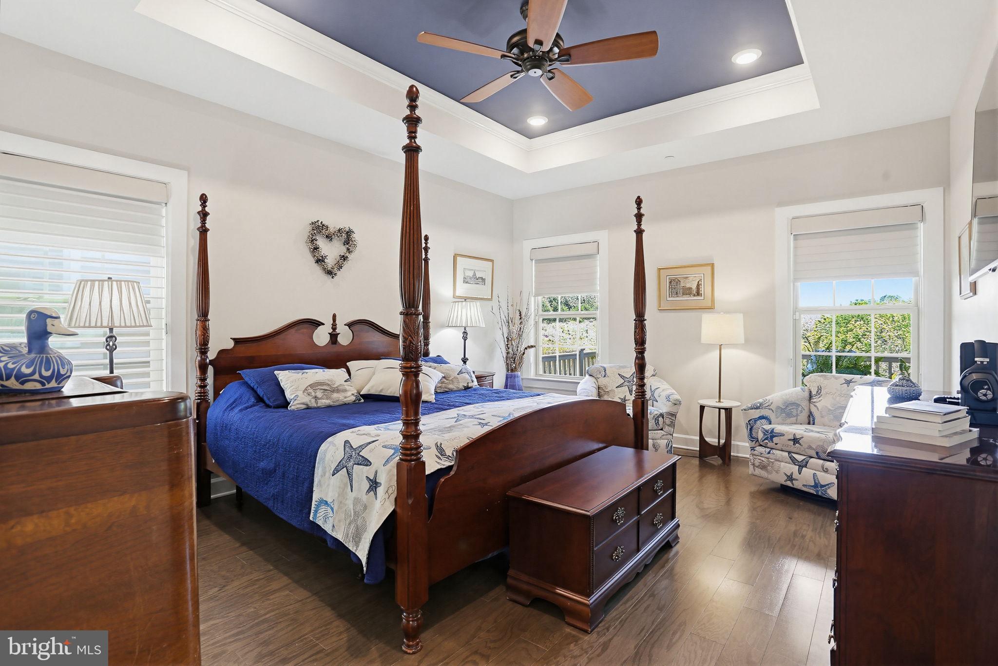 3816 Fulham Road Frederick, MD 21704 - Photo 18 of 77 a bedroom with a bed couch chandelier and a window