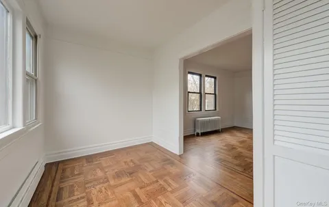 an empty room with windows