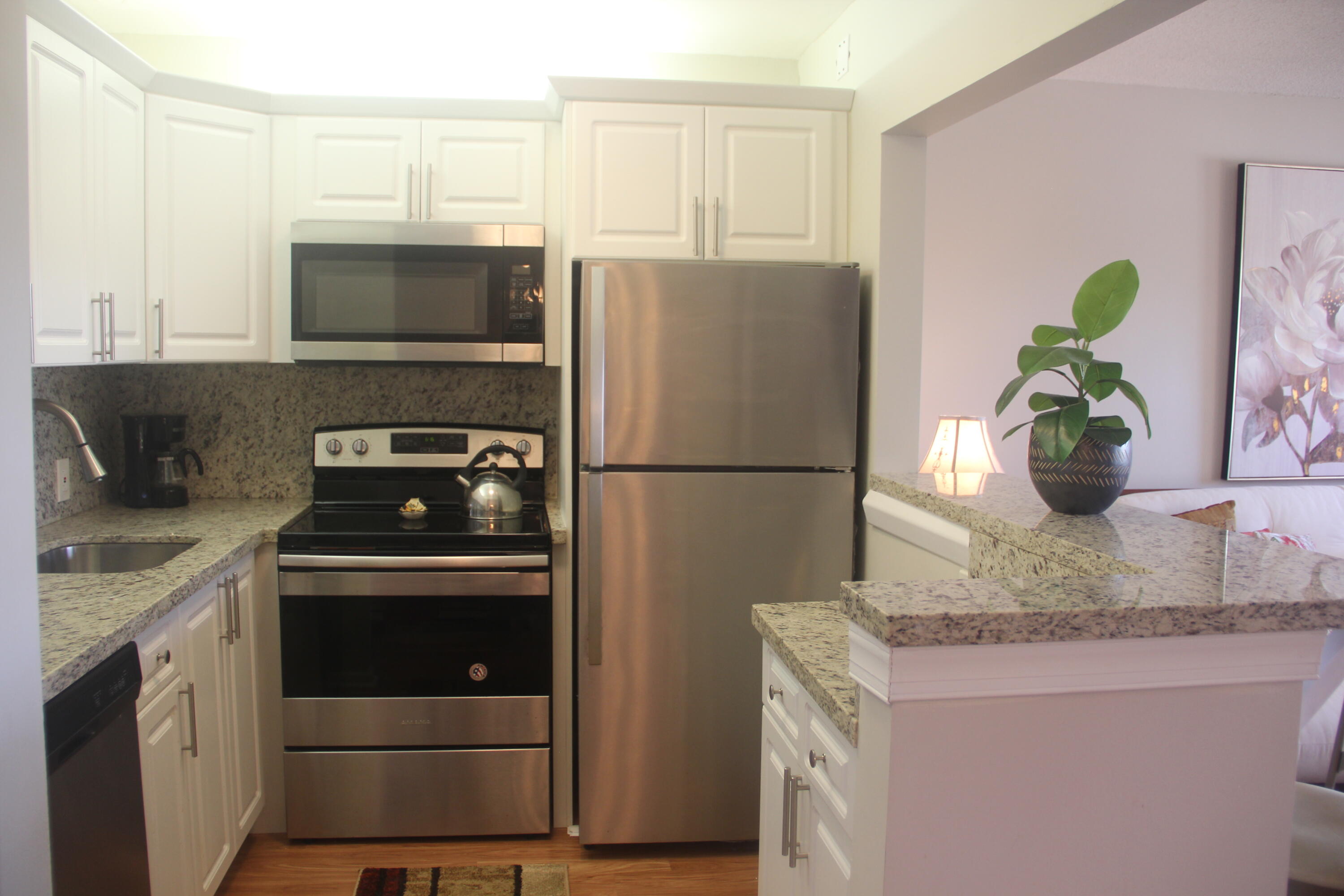 454 Fanshaw K Boca Raton, FL 33434 - Photo 4 of 30 Updated Kitchen-White Cabinets