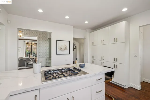 a bed room with a bed and a chair