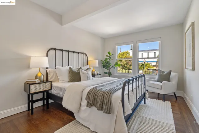 a bed room with a bed and a lamp