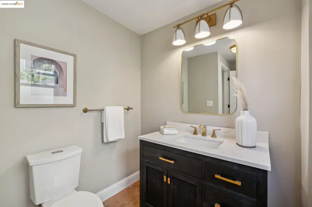 a room with table and a mirror