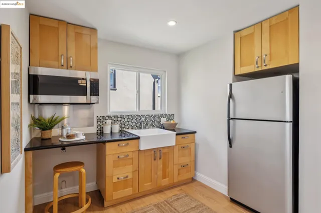 a bedroom with a bed and a mirror