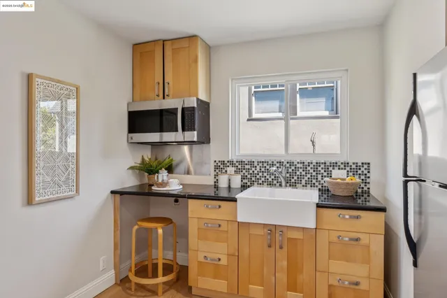 a bathroom with a sink toilet and mirror