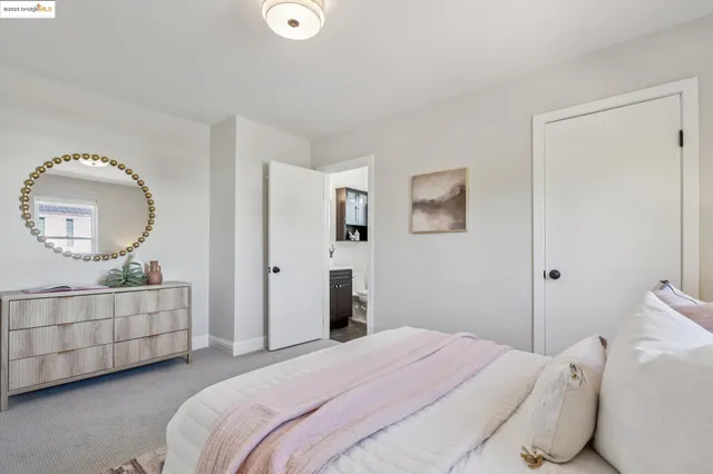 a living room with furniture and flowers