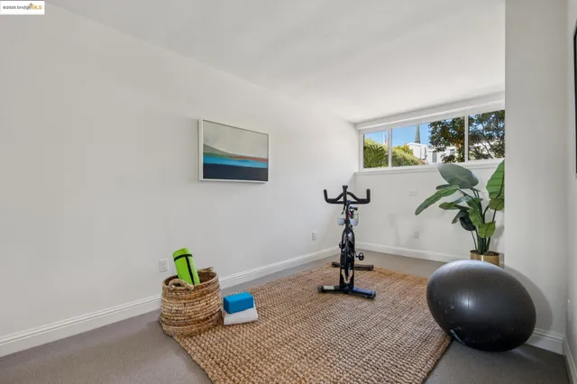 a view of a storage & utility room with racks on the wall