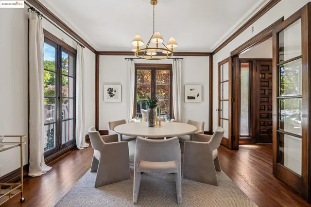 a dining room with furniture window wooden floor