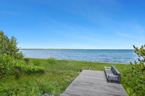 a view of a backyard with a garden