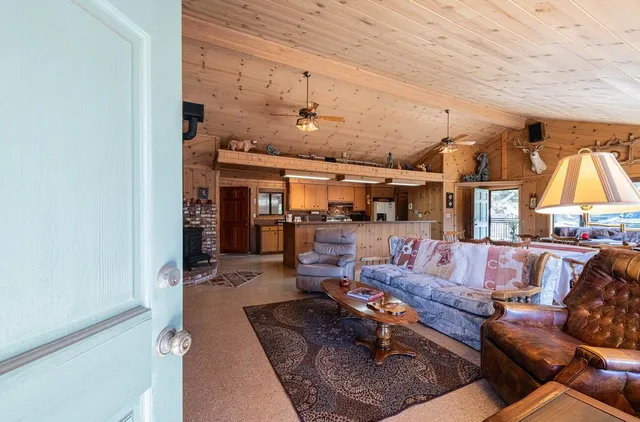 a bed room with bed and balcony